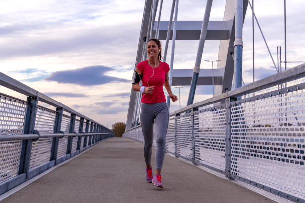 istock Fitness woman exercise outdoors on sunny summer morning 1272155174