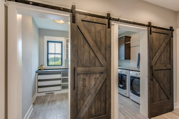 istock Huge laundry room with barn doors entrance 1272163093