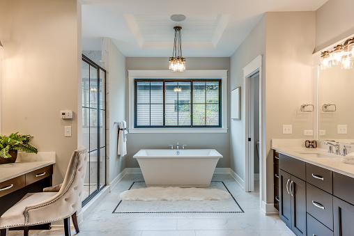 Black trim window frame on window and the glass shower door