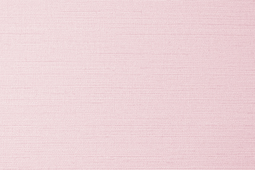 Cotton silk fabric wallpaper texture pattern background in light pastel sweet pale pink color tone