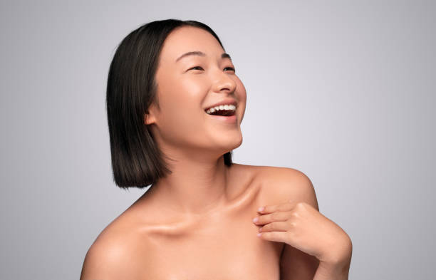 istock Delighted ethnic lady with perfect skin laughing 1272168735