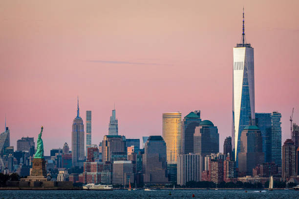 istock Lower Manhattan and Statue of Liberty 1272171520
