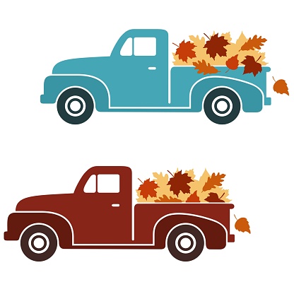 Set of two retro pickup trucks carrying fall leaves.