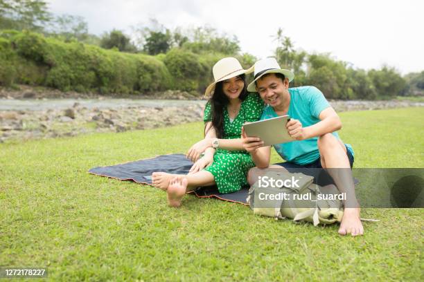 Asian Pregnant Woman Traveling On The Rural When Her Husband Working Online Stock Photo - Download Image Now