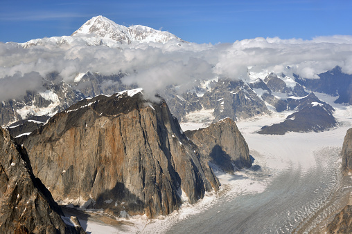 Alpine peaks, Aiguille du Midi and other famous alpine mountains. Alpinism, climbing, glaciers and snow.