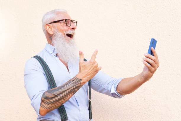 istock Senior man with a phone 1272182614