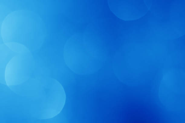 istock glitter light sparkle blue gorgeous bokeh defocused abstract background shiny. 1272187994