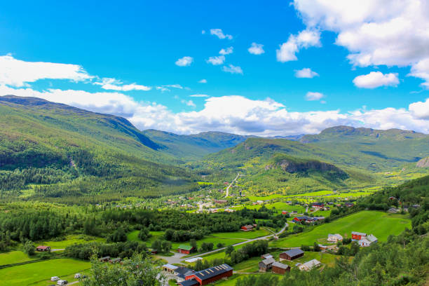 Panorama Norway, Hemsedal Mountains, red farmhouses, green meadows, Viken. Panorama Norway, Hemsedal Mountains, red farmhouses and green meadows, Viken, Buskerud. østfold stock pictures, royalty-free photos & images