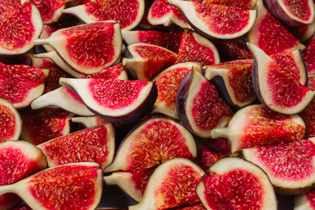 istock Tasty figs background. Top view. 1272197587