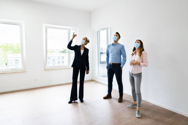 istock Happy Couple Looking New Home 1272197698