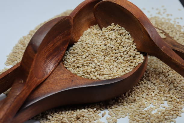 istock Organic natural Til Gul OR Sesame seeds over white background 1272198608