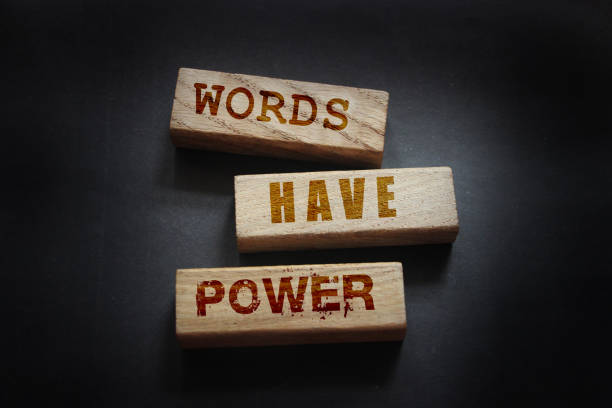 istock The phrase Words Have Power on wooden blockslaying on black background. Copywriting advertising piar concept 1272199367
