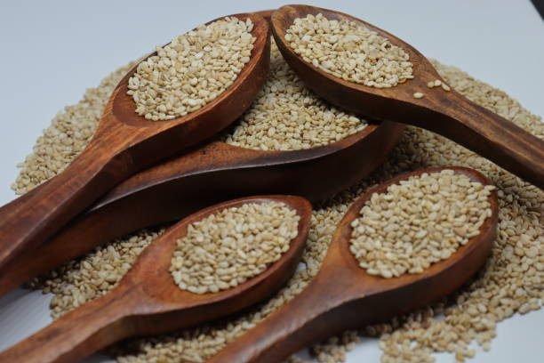 istock Organic natural Til Gul OR Sesame seeds over white background 1272199507