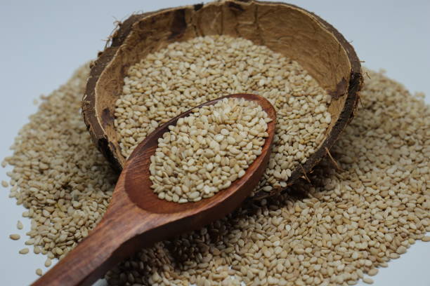 istock Organic natural Til Gul OR Sesame seeds over white background 1272199573