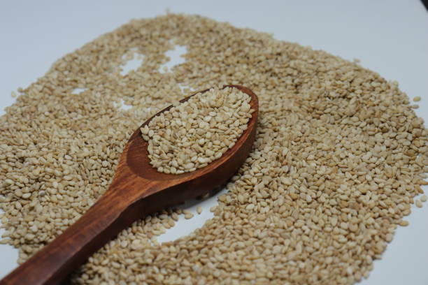 istock Organic natural Til Gul OR Sesame seeds over white background 1272200270
