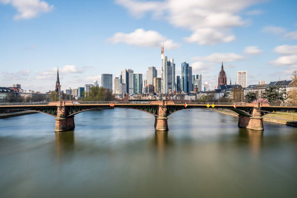 istock Frankfurt, Germany - March 31, 2020: frankfurt skyline view with ignas bubis bridge 1272200280