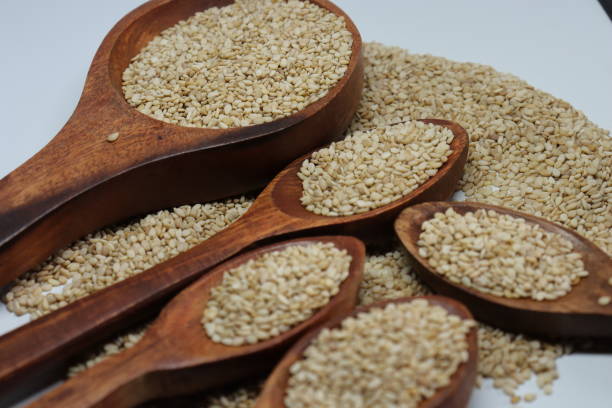 istock Organic natural Til Gul OR Sesame seeds over white background 1272200558