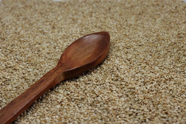 istock Organic natural Til Gul OR Sesame seeds over white background 1272200615