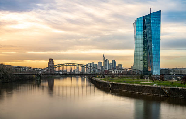 istock view on frankfurt skyline at sunset from east harbor bridge with reflections in the main river, frankfurt am main, germany 1272200630