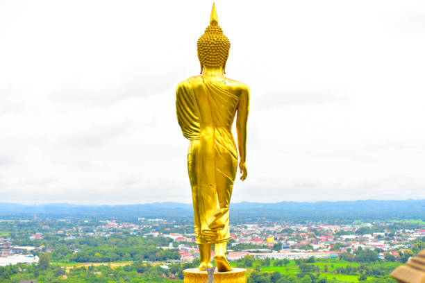 Gold Buddha statue on park.Nan thailand.