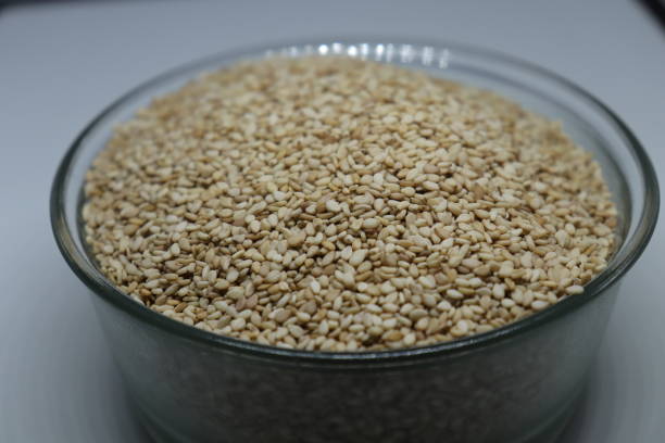istock Organic natural Til Gul OR Sesame seeds over white background 1272202404