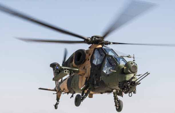 istock T129 Atak Military attack helicopter in flight 1272203088