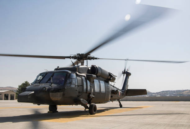 istock military helicopter on heliport 1272203105