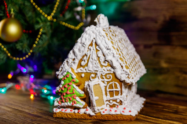 istock Christmas Gingerbread house on a wooden table 1272205347