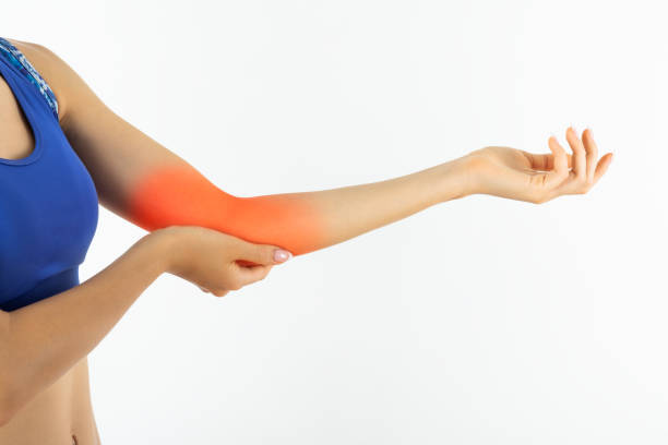istock Young woman with elbow pain 1272206500