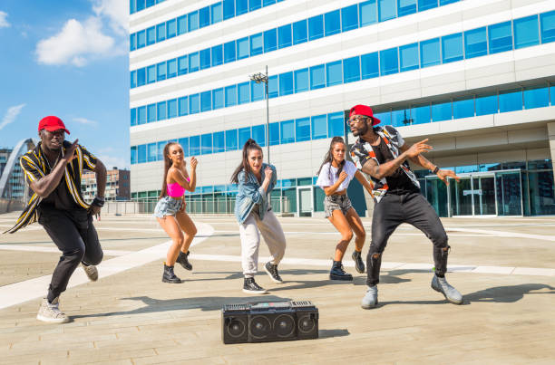 istock Hip hop crew dancing outdoors 1272206619