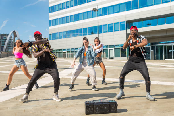 istock Hip hop crew dancing outdoors 1272207147