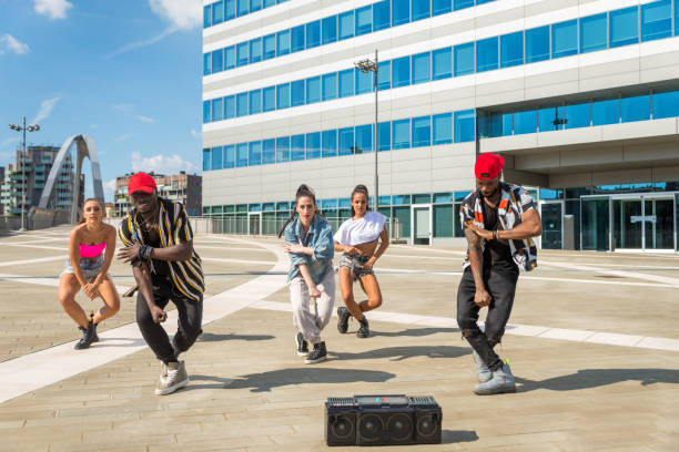 istock Hip hop crew dancing outdoors 1272207575