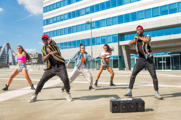 istock Hip hop crew dancing outdoors 1272208251