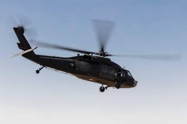 istock Military Utility Helicopter in flight 1272208269