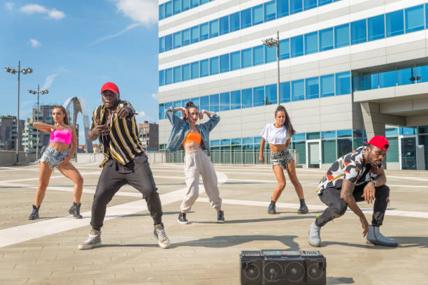 istock Hip hop crew dancing outdoors 1272208300