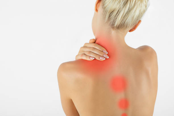 Professional masseur doing therapeutic massage with pressure points