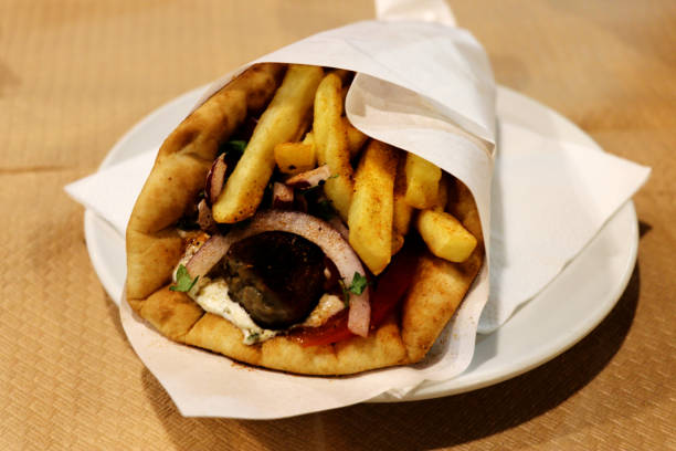 istock Greek gyros lamb kebab - close up 1272212943