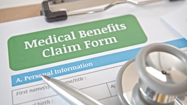 Medical benefits claim form on a table in a doctor or physician office