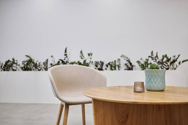 istock Beige armchair in a modern minimalistic studio apartment 1272216028