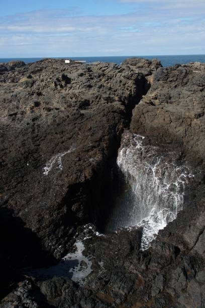 istock Water receding back into a Blowhole 1272216258