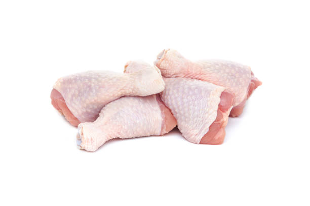 istock Set of five fresh raw chicken drumsticks on a white background. 1272217083