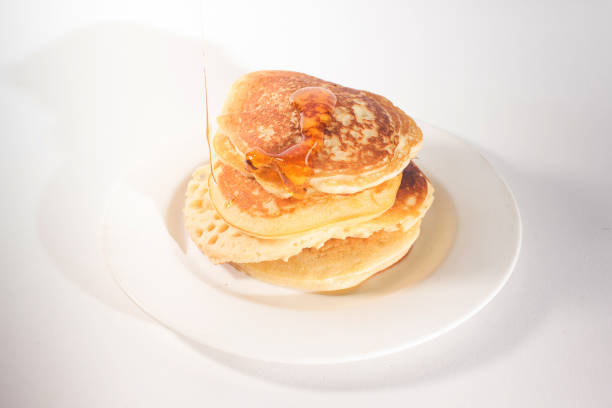 istock The pancakes are topped with honey 1272217610