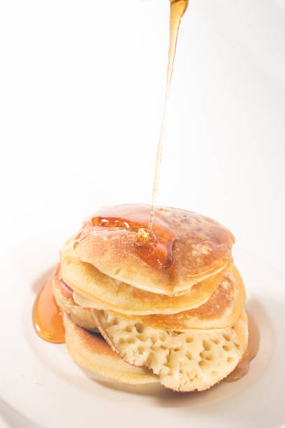 istock The pancakes are topped with honey 1272217617