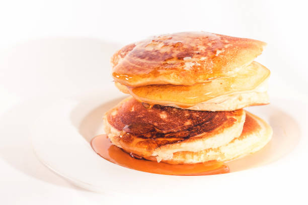 istock The pancakes are topped with honey 1272217636