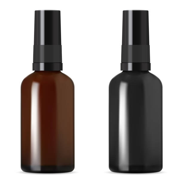 istock Black and brown cosmetic dropper bottle for serum 1272219560