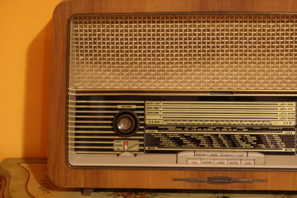 istock old radio with orange background 1272220142