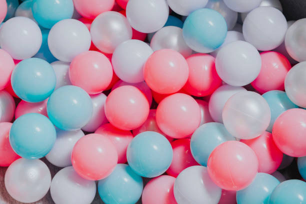 istock lots of pink, white and blue plastic balls, 1272220777