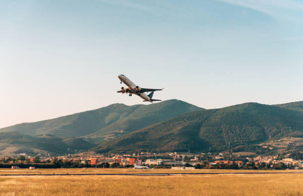airplane take off airplane take off florence italy airport stock pictures, royalty-free photos & images