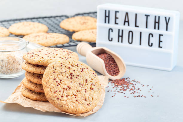 istock Healthy oatmeal and red quinoa cookies, light board on background, horizontal, copy space 1272222196