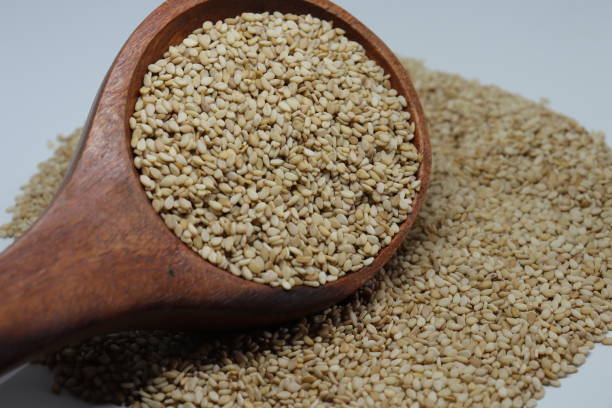 istock Organic natural Til Gul OR Sesame seeds over white background 1272223587